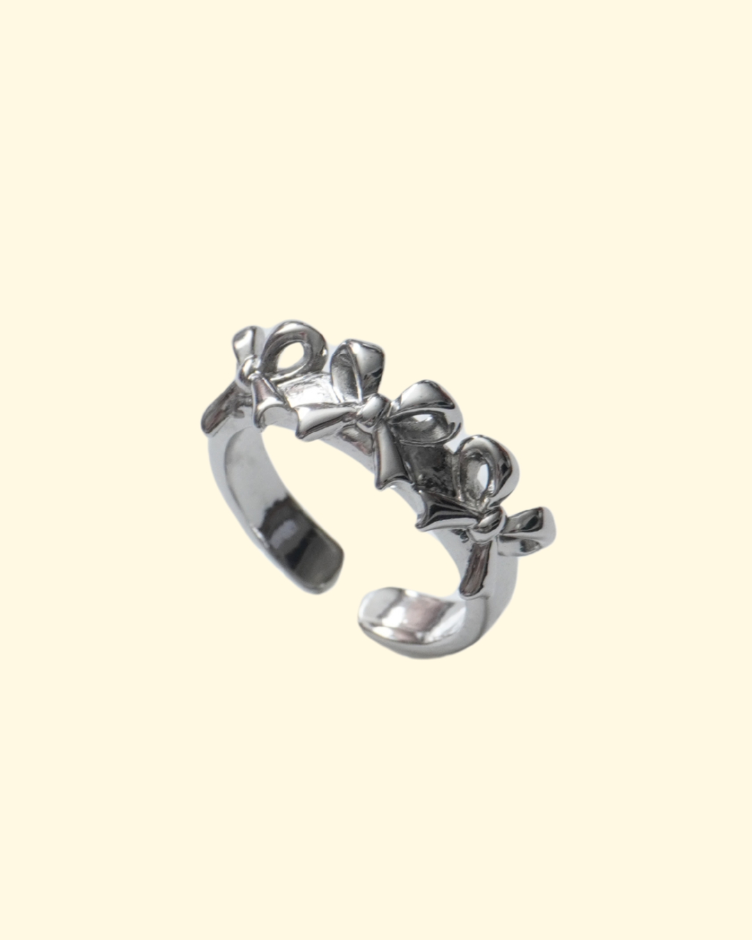 TRIPLE RIBBON RING